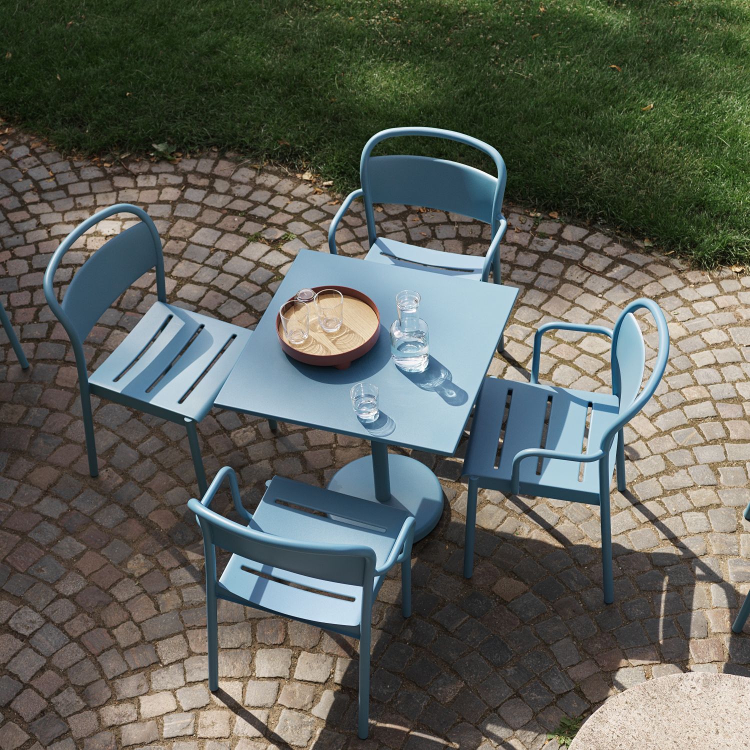 linear-steel-cafe-table-70x70-h73-side-chair-armchair-pale-blue-raise-carafe-glass-platform-tray-muuto-org